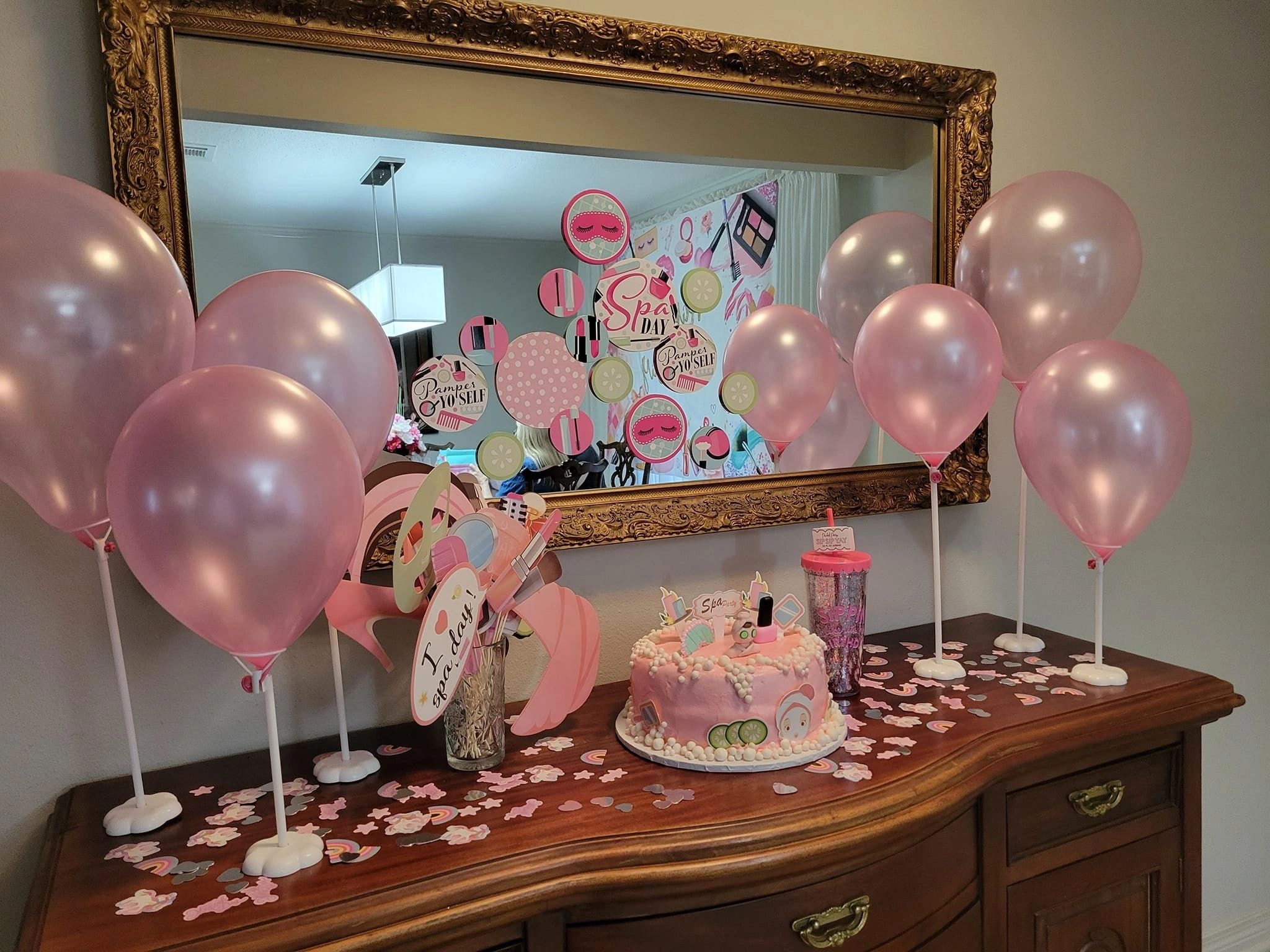Birthday party setup with makeup-themed decorations by Touches by Jen